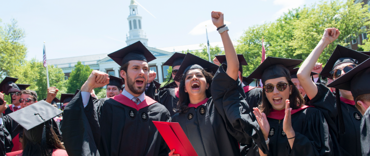 students cheering at commencement ceremony