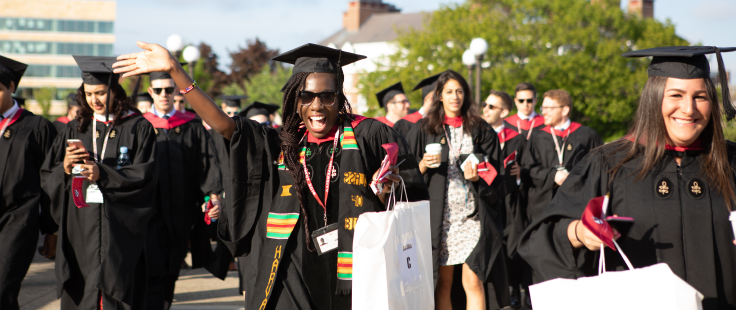 student celebrating on graduation day